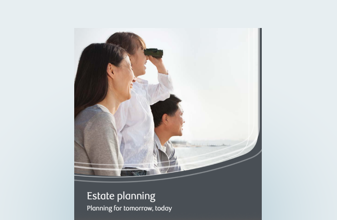 Cover of the estate planning guide featuring a family using binoculars as they overlook a body of water.
