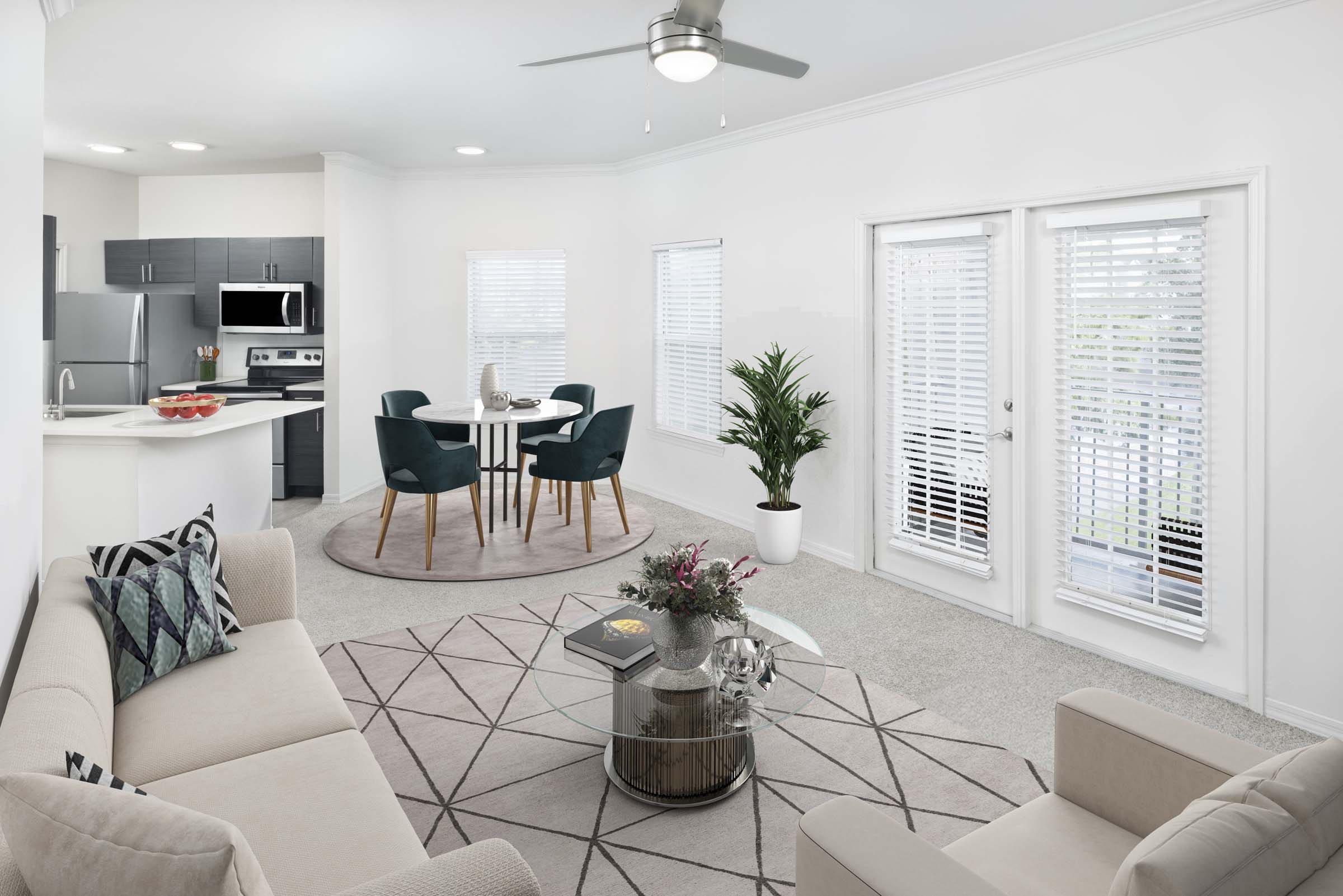 Open-concept living room and kitchen at Camden Lee Vista apartments in Orlando, FL