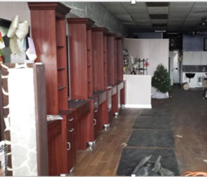 The beauty salon had a station water hose burst during the night. With rapid water removal the bases of the work stations did not suffer much water damage. SERVPRO helps keep your doors open for business.