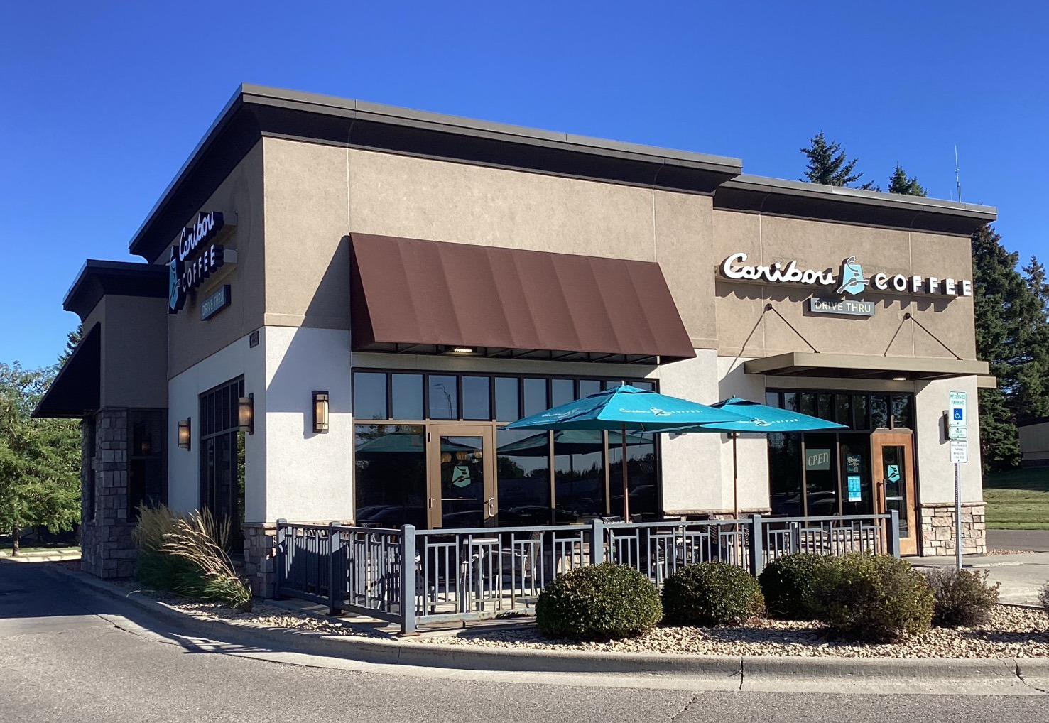 Storefront of the Caribou Coffee at 1225 S Columbia Road in Grand Forks