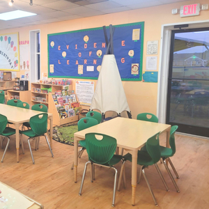 Bright and colorful preschool classroom at Childcare Network with age-appropriate learning materials