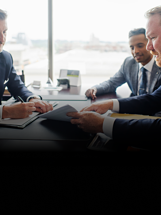 Elinesky Schuett team members collaborating.