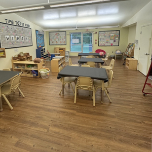 Bright and colorful preschool classroom at Childcare Network with age-appropriate learning materials