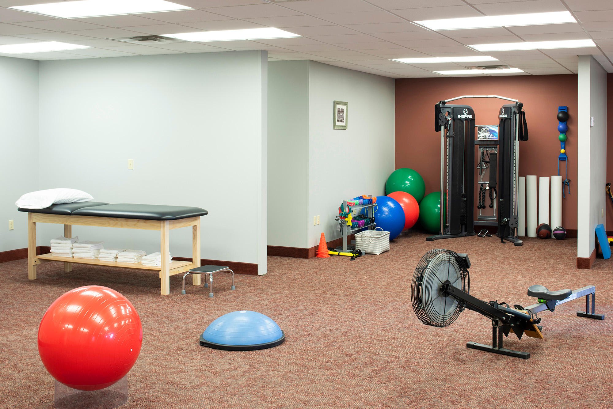 Bedford Fitness offers physical therapy, personal training, and massage—all in one location. We’re your go-to source for overall health and wellness.

Are you recovering from surgery or an injury? We can get you back in tip-top shape. Is your goal weight loss? We can help you shed pounds. Are you training for a marathon? We can help build your stamina and give you a competitive edge. Do you want to achieve a healthier lifestyle? We can help with that, too.

Our physical therapist works with you one-on-one to customize programs for post-surgical therapy, chronic pain management, and sports-related injury rehab. And our personal trainer offers transition programs that bridge the gap for those who want to continue getting stronger and more fit after they have completed physical therapy. We are also the place for athletes looking to train for a race or improve their body mechanics for golf—as well as anyone who wants to get stronger and boost their energy.

Innovative services like trigger-point dry needling, running evaluations, Thai massage therapy, and glide disc sliding group fitness can help improve your health. 
In addition to personal fitness training, our exercise facility hosts small group fitness classes tailored to senior fitness, pre-natal and post-natal fitness, strength training, and preventative care. And if you like to work out at home, we can personalize exercise demo videos for online personal training.