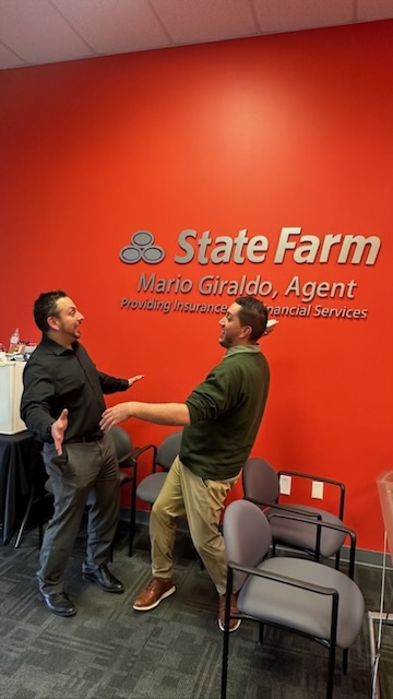 Celebrating the holidays at Mario Giraldo's State  Farm office!