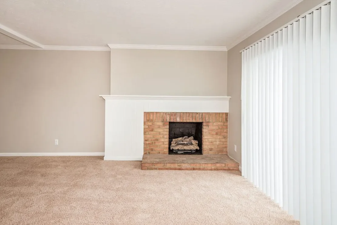 Living room view with a fireplace