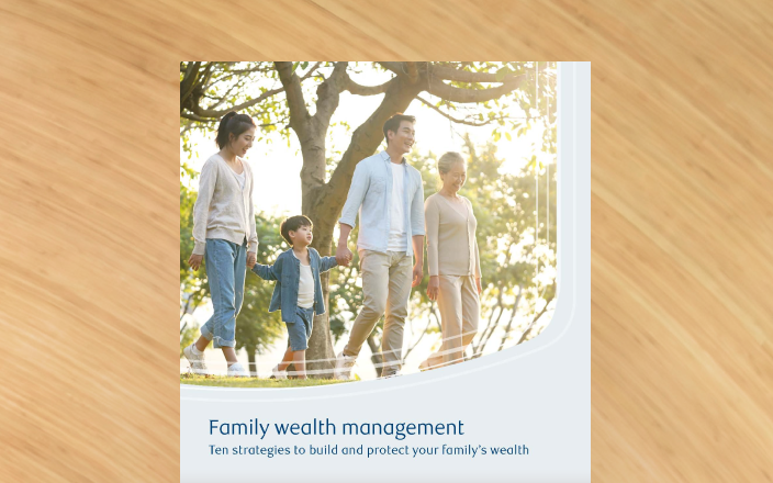 Cover of the family wealth guide with a multigenerational family.