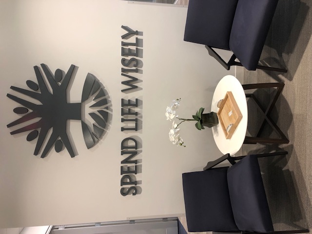 First United Bank - McKinney Redbud - interior "Spend Life Wisely" sign