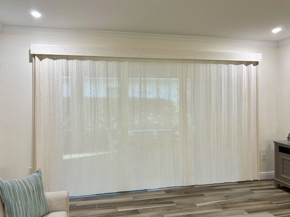 Upgrade your home with a gorgeous, natural feel this summer with our gorgeous woven wood shades! Notice how these shades blend beautifully with the walls in this local Vero Beach home, while providing shade and UV protection. Our shades are customizable, so you can find the perfect fit for any windo