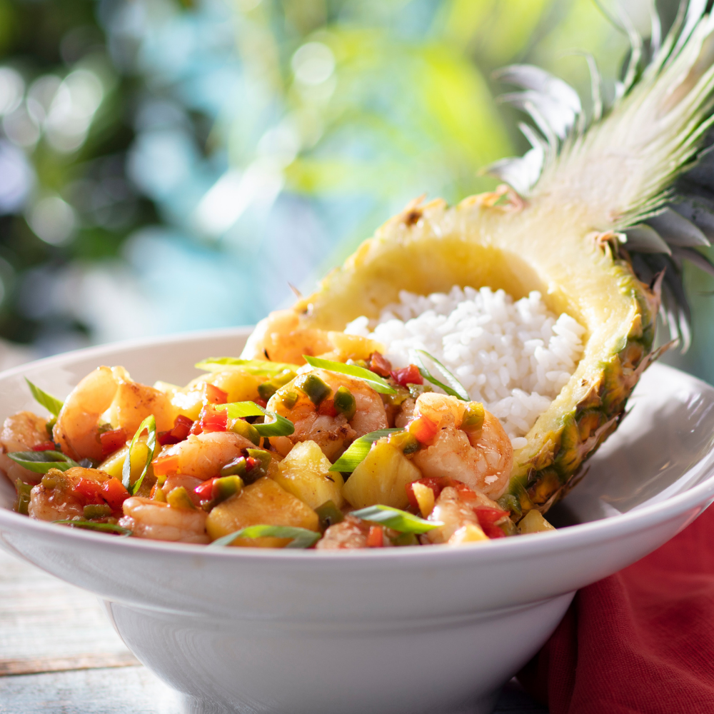 NEW! Jerk Shrimp Pineapple Bowl - Sautéed shrimp, white rice, diced pineapples and sweet peppers tossed in a jerk pineapple glaze. Served in a fresh-cut pineapple bowl.