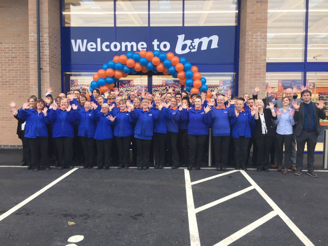 B&M's store team celebrate on opening day at the retailer's new store on Burgh Road Retail Park, Skegness.