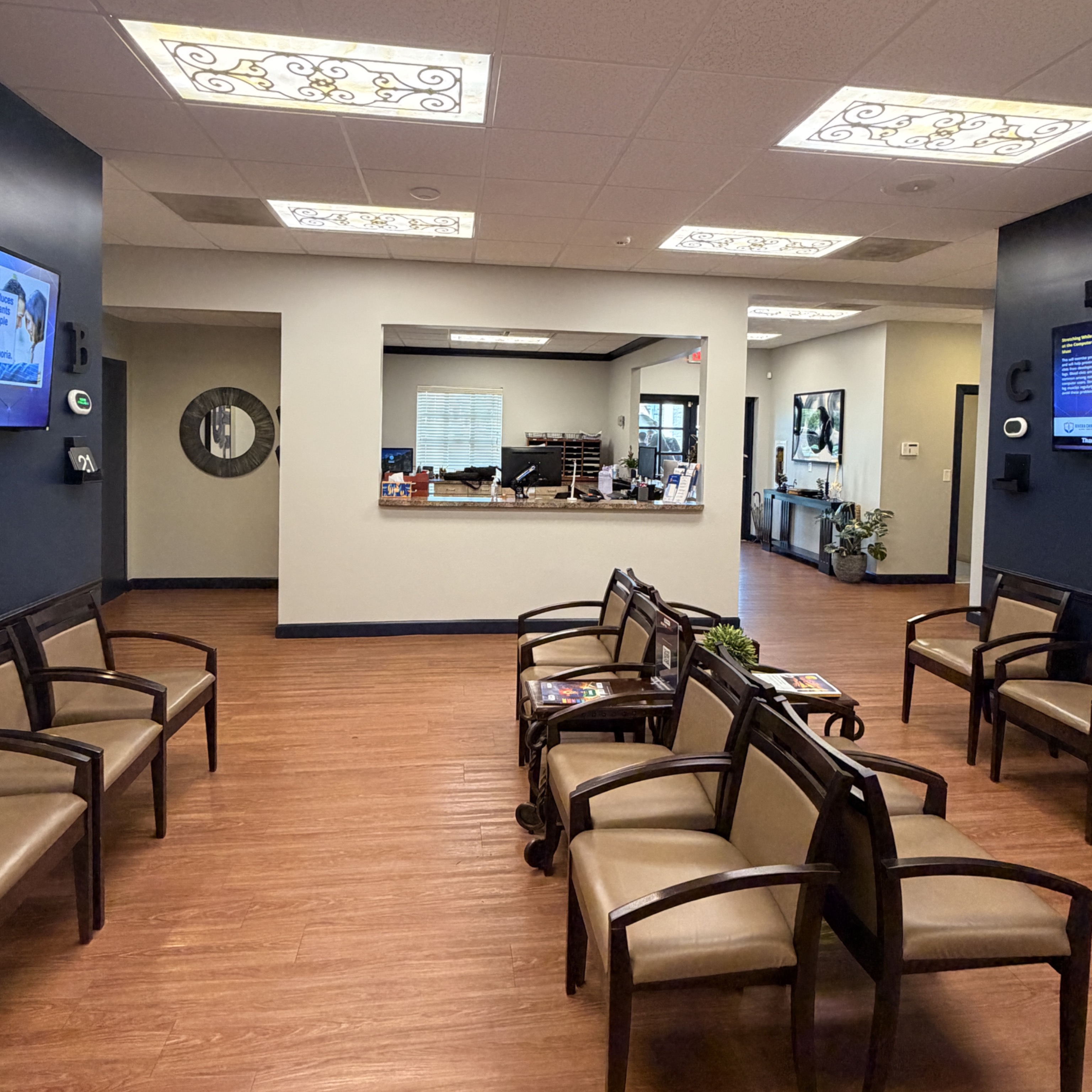 Our lobby from the waiting area. It's bright and open, with a clear view of the front desk. 