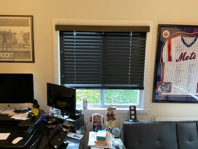 Our jet-black Wood Blinds are truly the perfect choice for this home office in Ossining, New York, giving it total privacy and creating a bold aesthetic in the room.