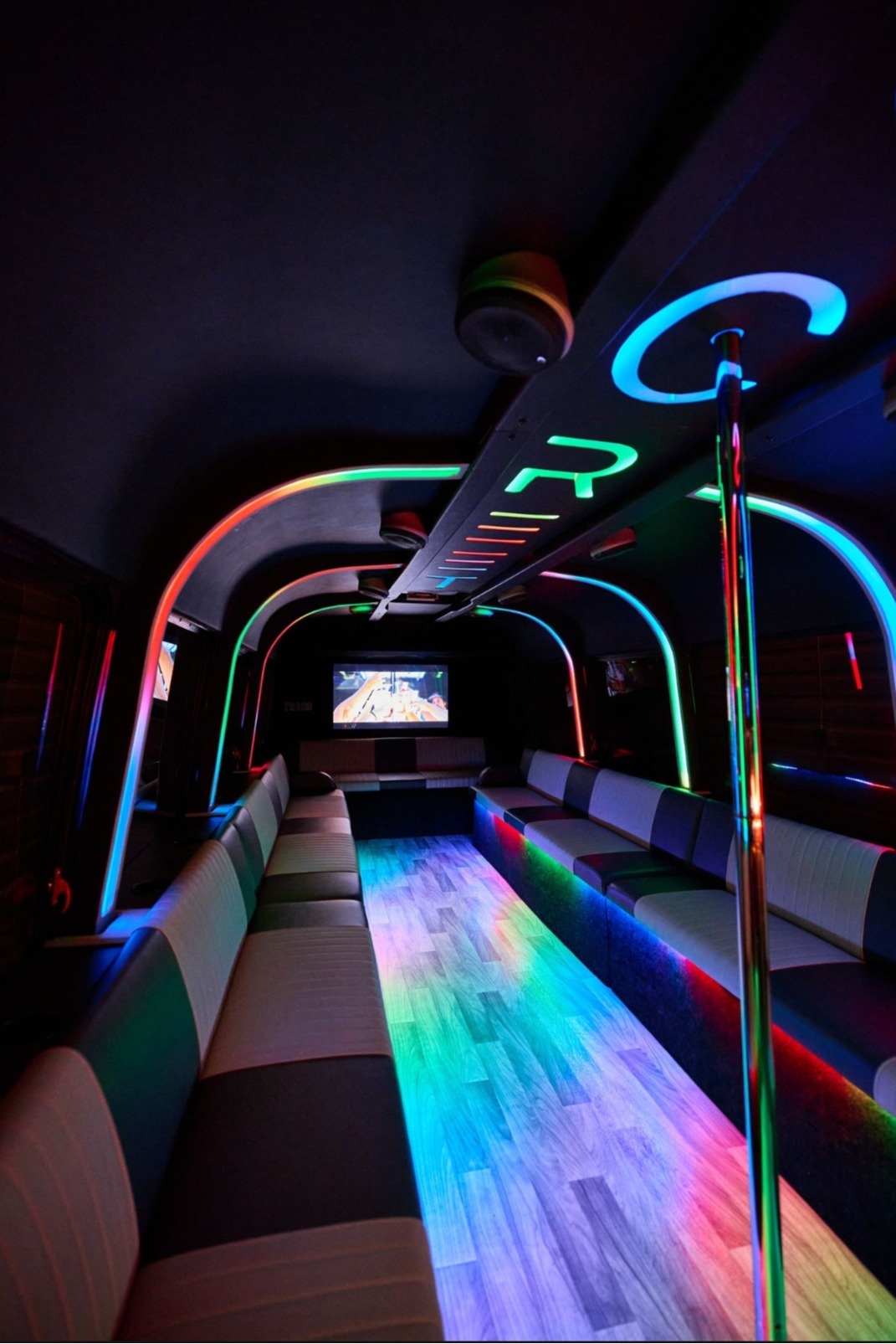 Las Vegas Party Bus 30 Passenger Party Bus No Limit with dance pole, bar and state of the art sound and lighting.