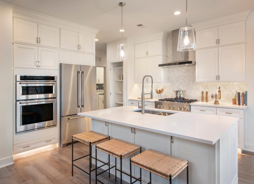 Well-appointed kitchens with large center islands perfect for entertaining