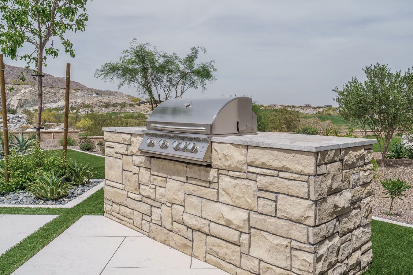 Fairways in Victory at Verrado - Sawgrass Model Home - Backyard Stone Grill