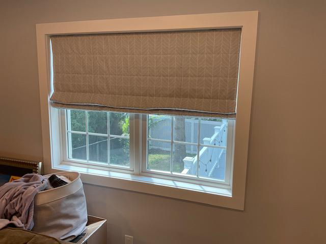 This living room in Hawthorne created a focal point with their windows with our chic, patterned Roman Shades. Bring a sense of simplicity and sophistication by adding the perfect coverings for your window.  #BudgetBlindsOssining #RomanShades #HawthorneNY #FreeConsultation #WindowWednesday