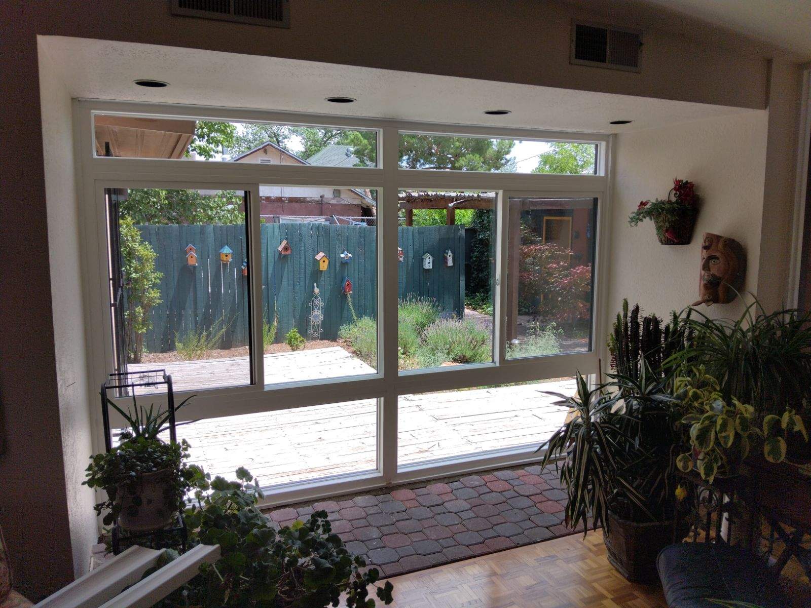 Enclose your patio slider into a window wall.