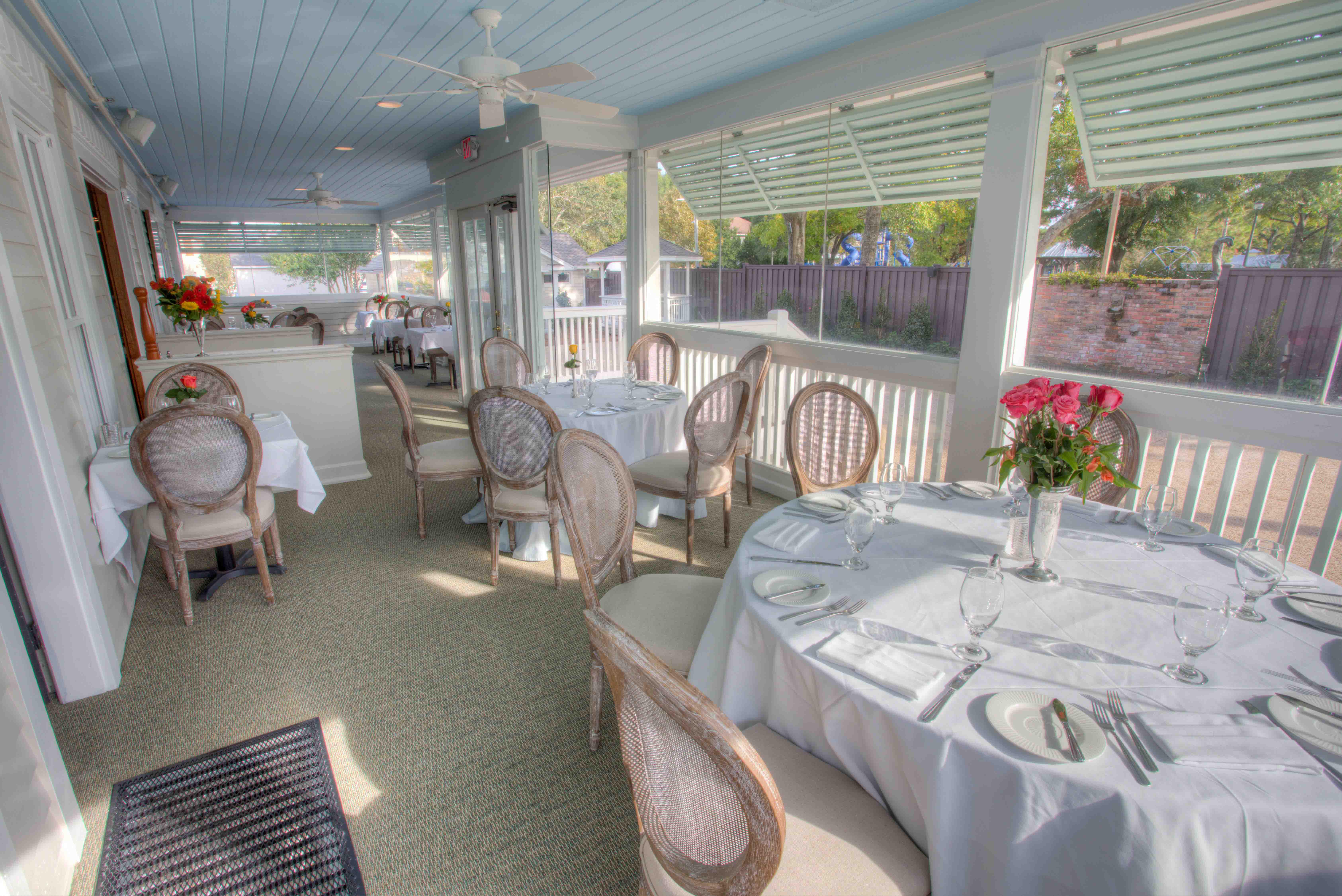 Side porch dining area overlooking courtyard - The Fairhope Inn Restaurant and B&B
Historic Downtown Fairhope Alabama