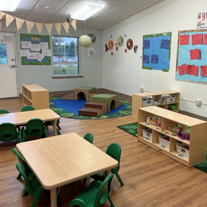 Bright and colorful preschool classroom at Childcare Network with age-appropriate learning materials