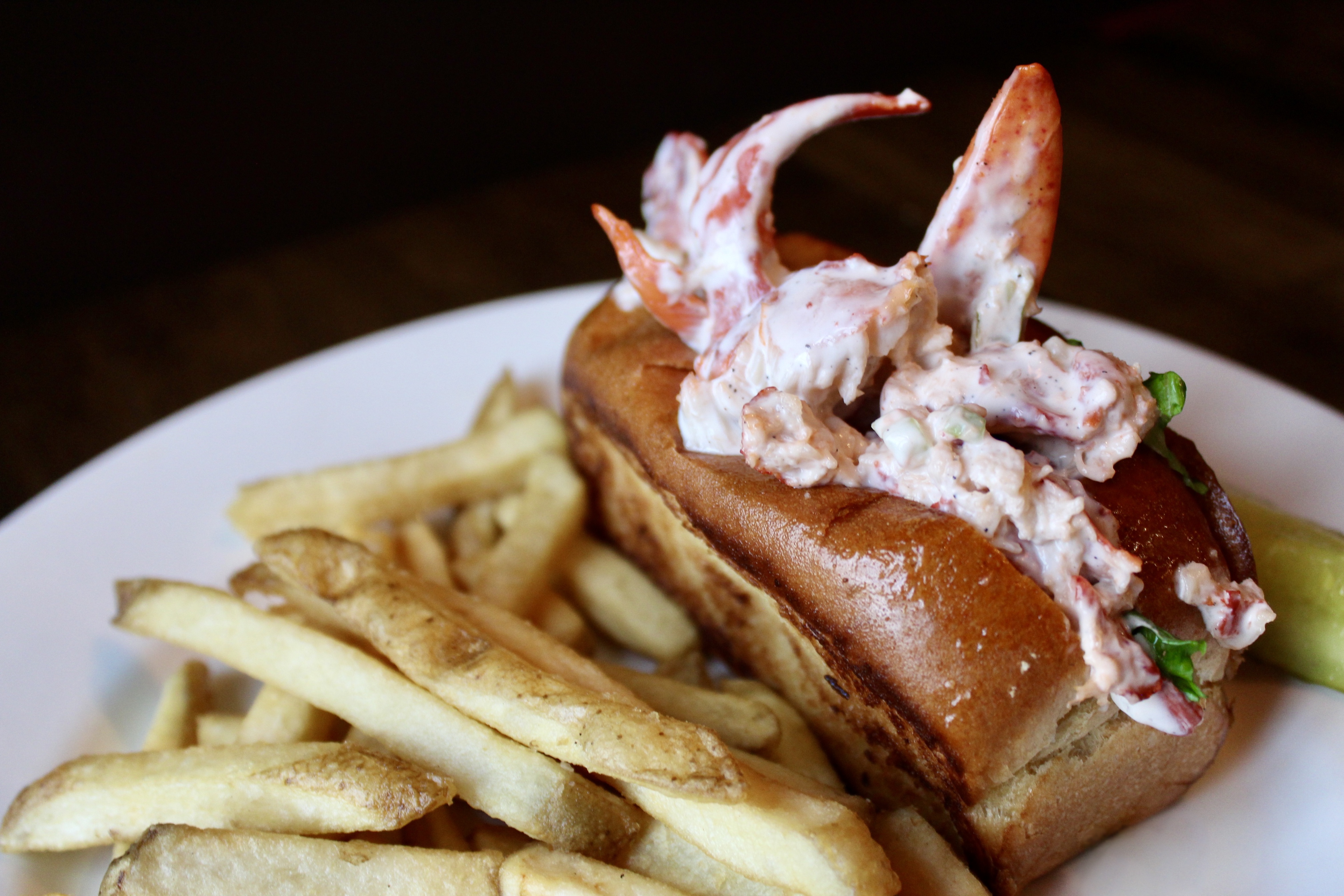 Lobster Roll with chilled lobster salad, served with fries & pickle 