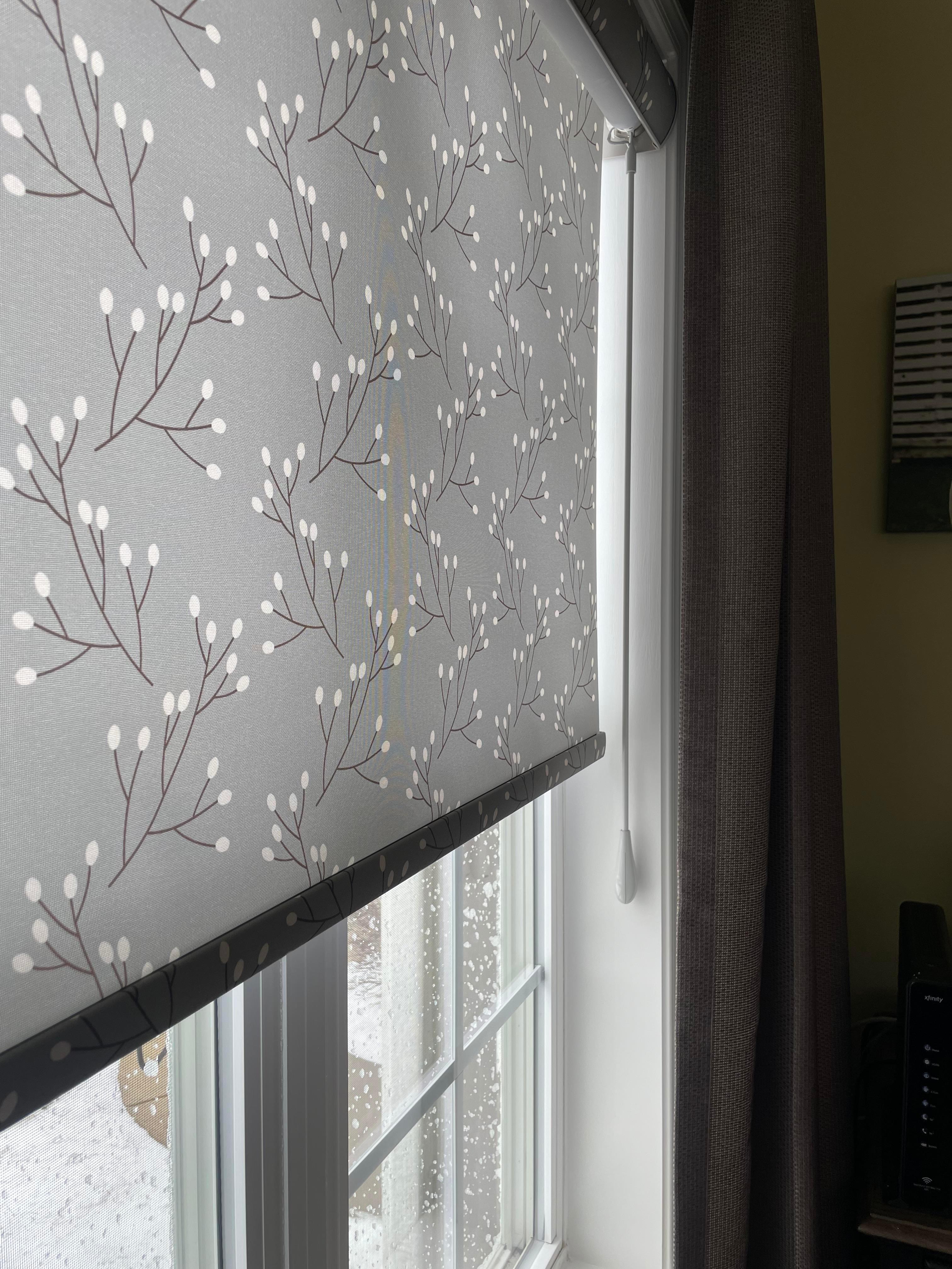 Lots of choices for graphic printed roller shades, such as this beautiful gray floral print.