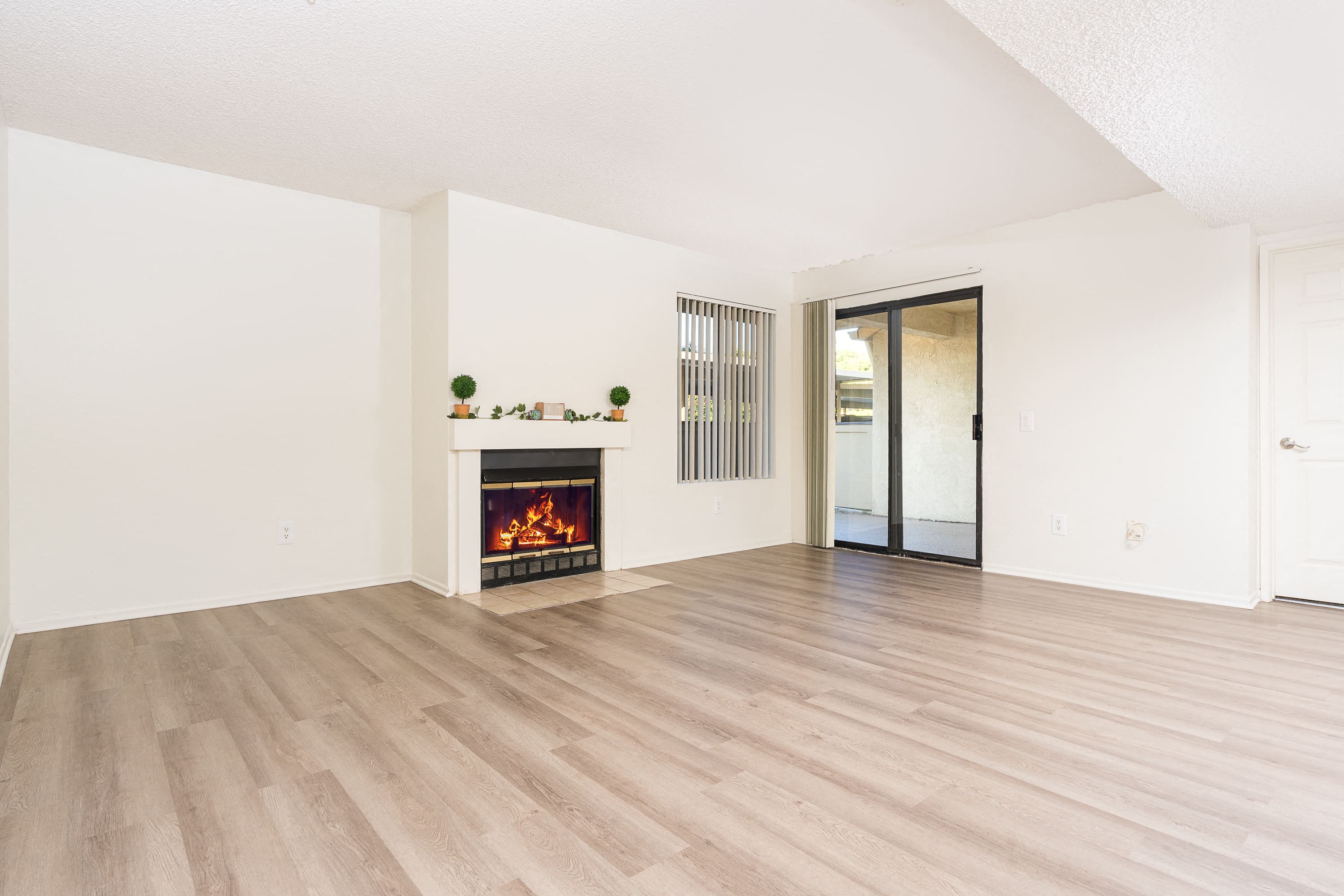 Living Room with Fireplace and High Ceilings
