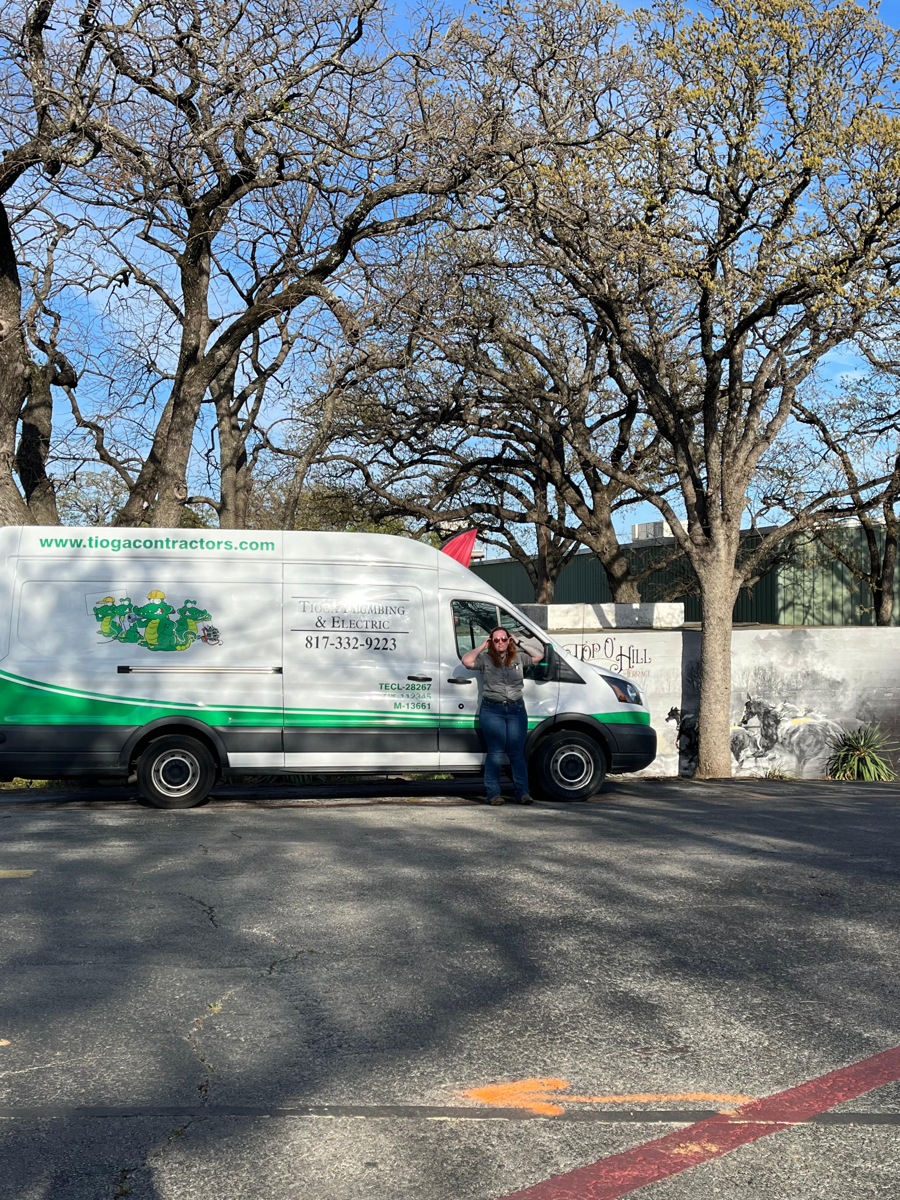 One of the Tioga Plumbing & Drain vans in Arlington Texas at Top O' Hill Terrace.