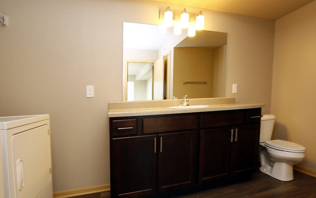 Bathroom with mirror and sink