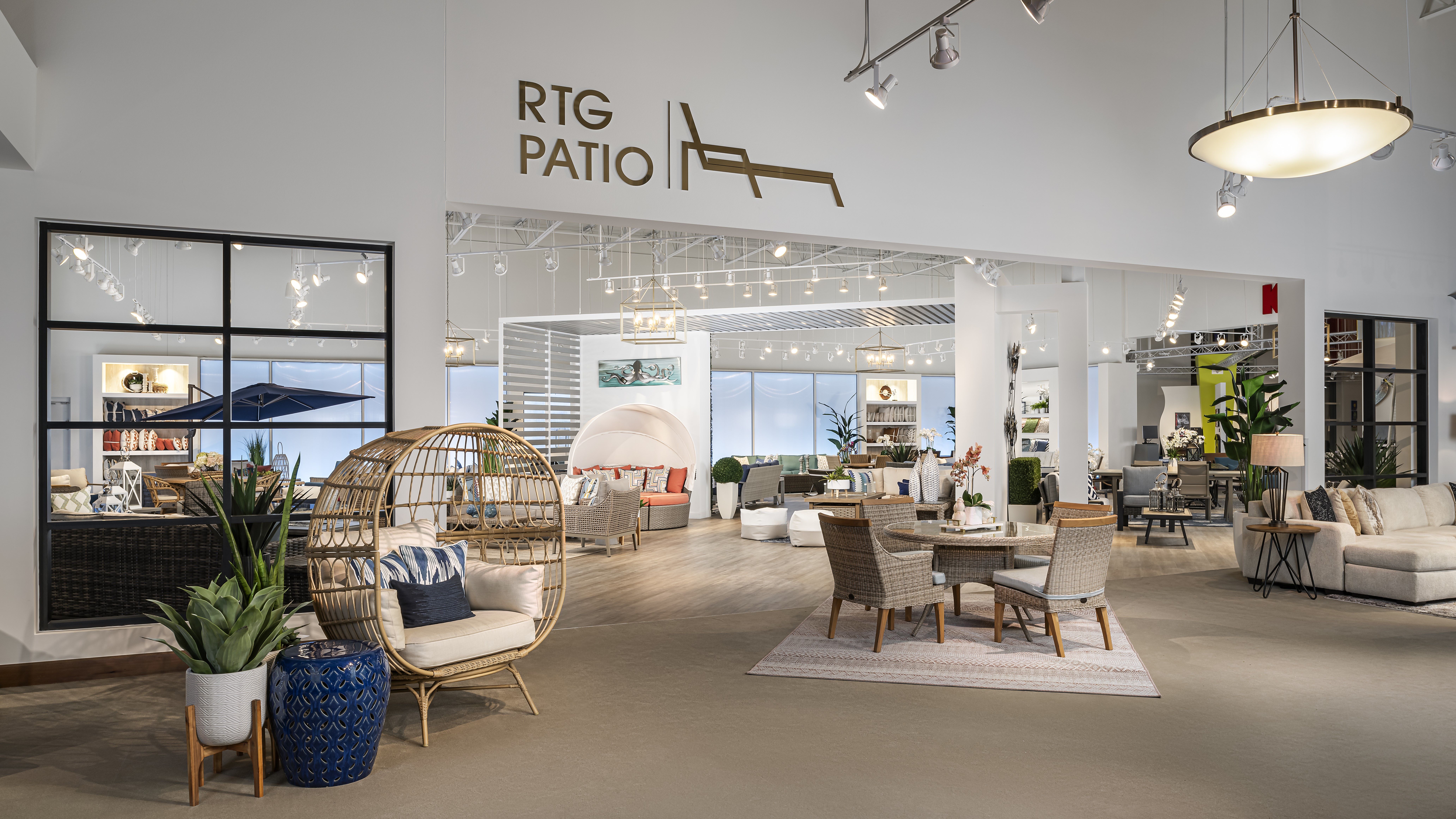 RTG Patio showroom entrance with stylish furniture displays.