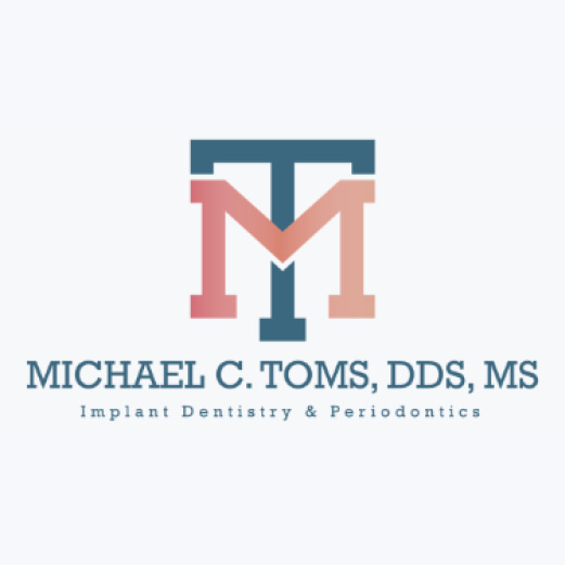 Michael C. Toms D.D.S., M.S Logo