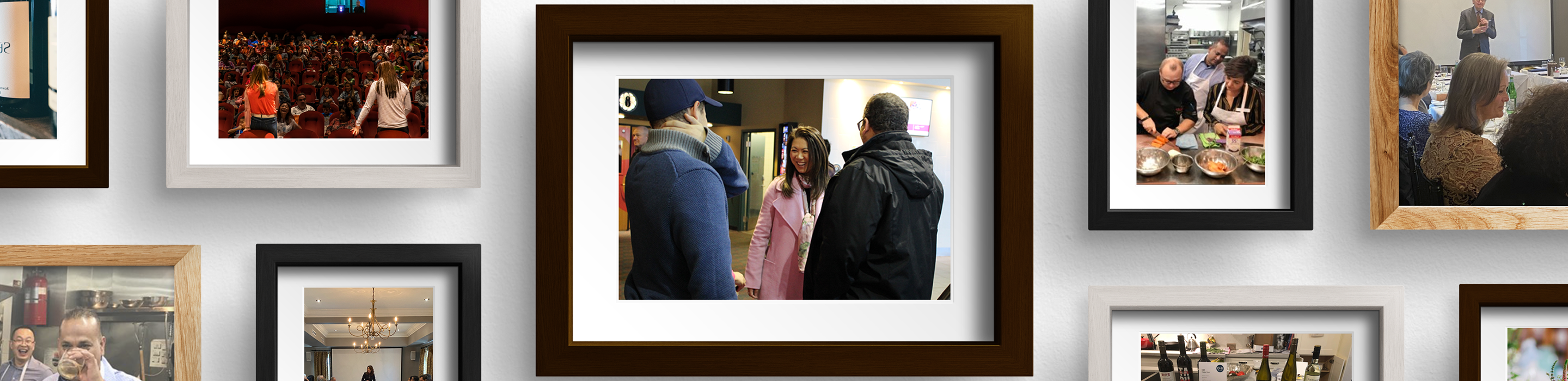 Gallery wall with memories featuring members of the Yvonne Chan Family Wealth team.