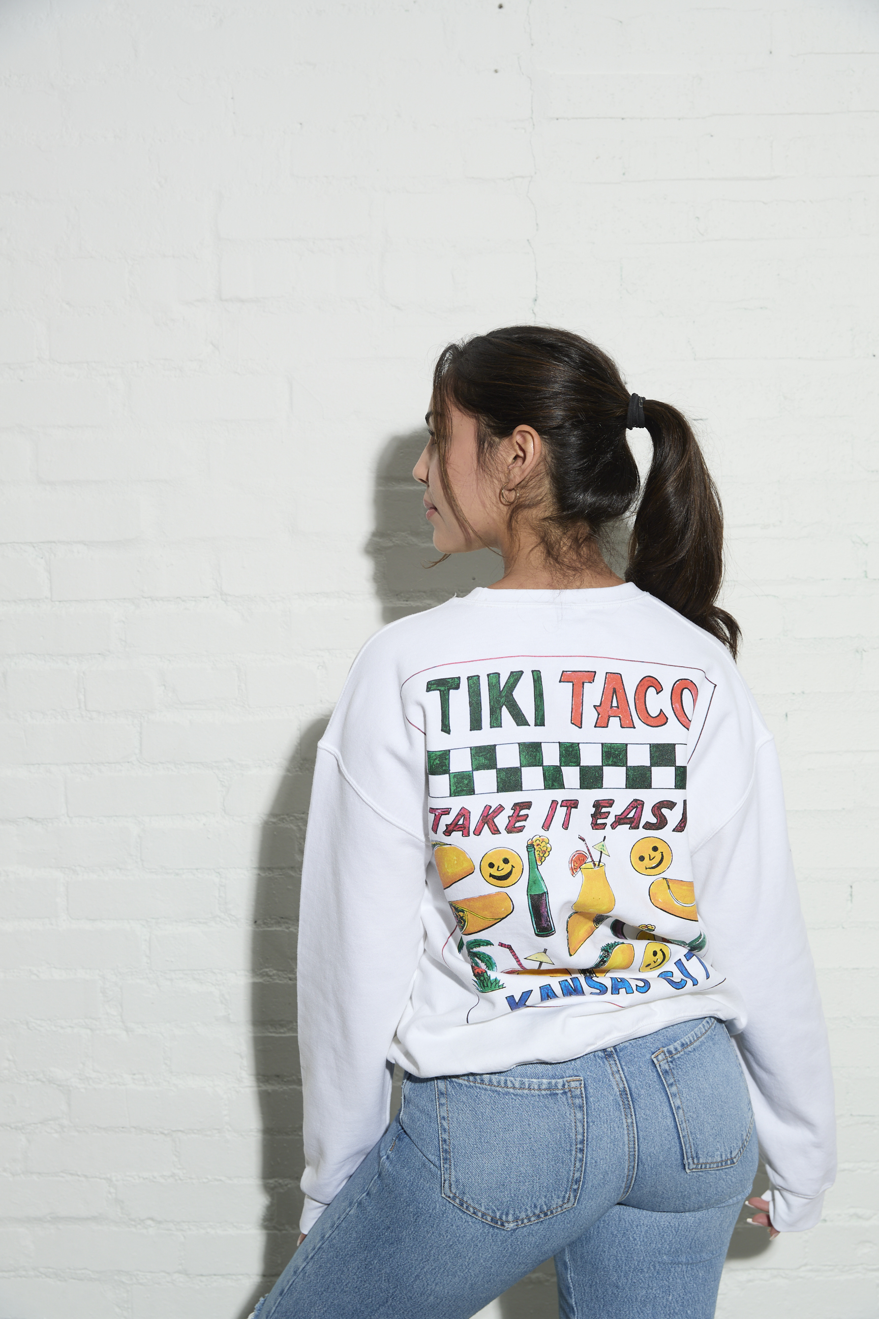 White Sweatshirt with Tiki Taco Take it Easy Graphic