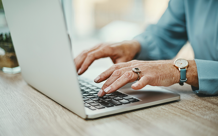 A client accessing a guide on their laptop.