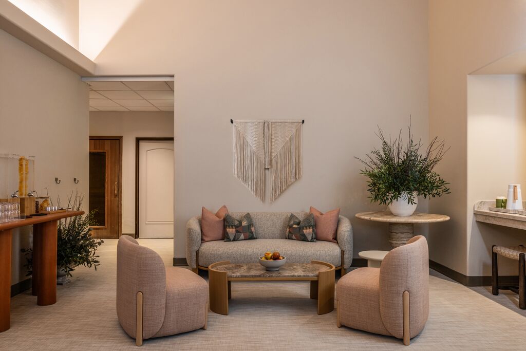 Soft seating, warm light, and nowhere to be. The spa lounge is where the day slows down on purpose.