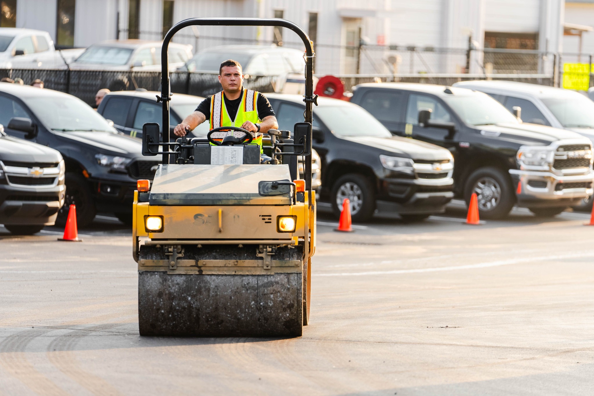 Blackjack Paving Contractor Driving a Compaction Roller