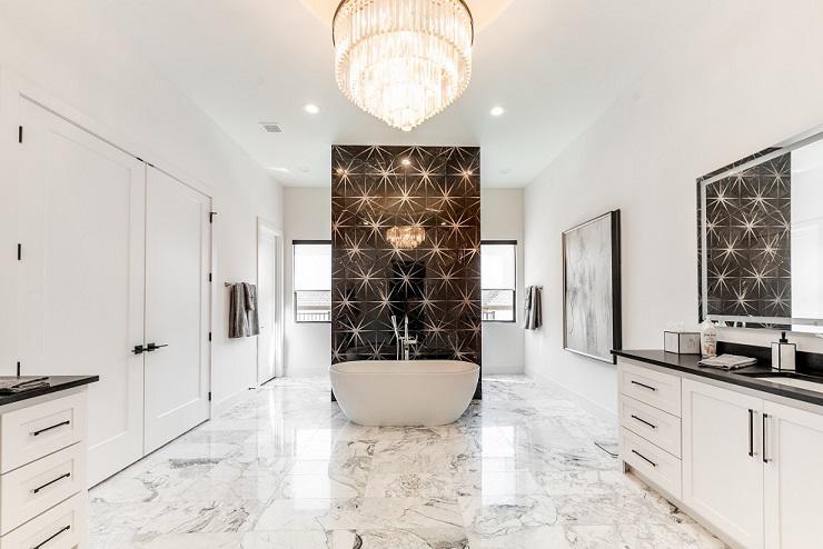 This bathroom is the height of luxury—and if you take a look at the windows, you’ll see we put our own spin on it! Those are our Motorized Roller Shades, easy to open and close when you need to use the shower!