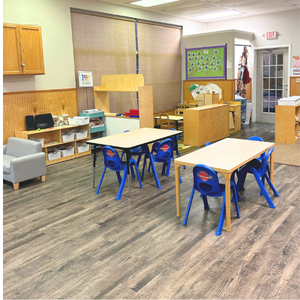 Bright and colorful preschool classroom at Childcare Network with age-appropriate learning materials