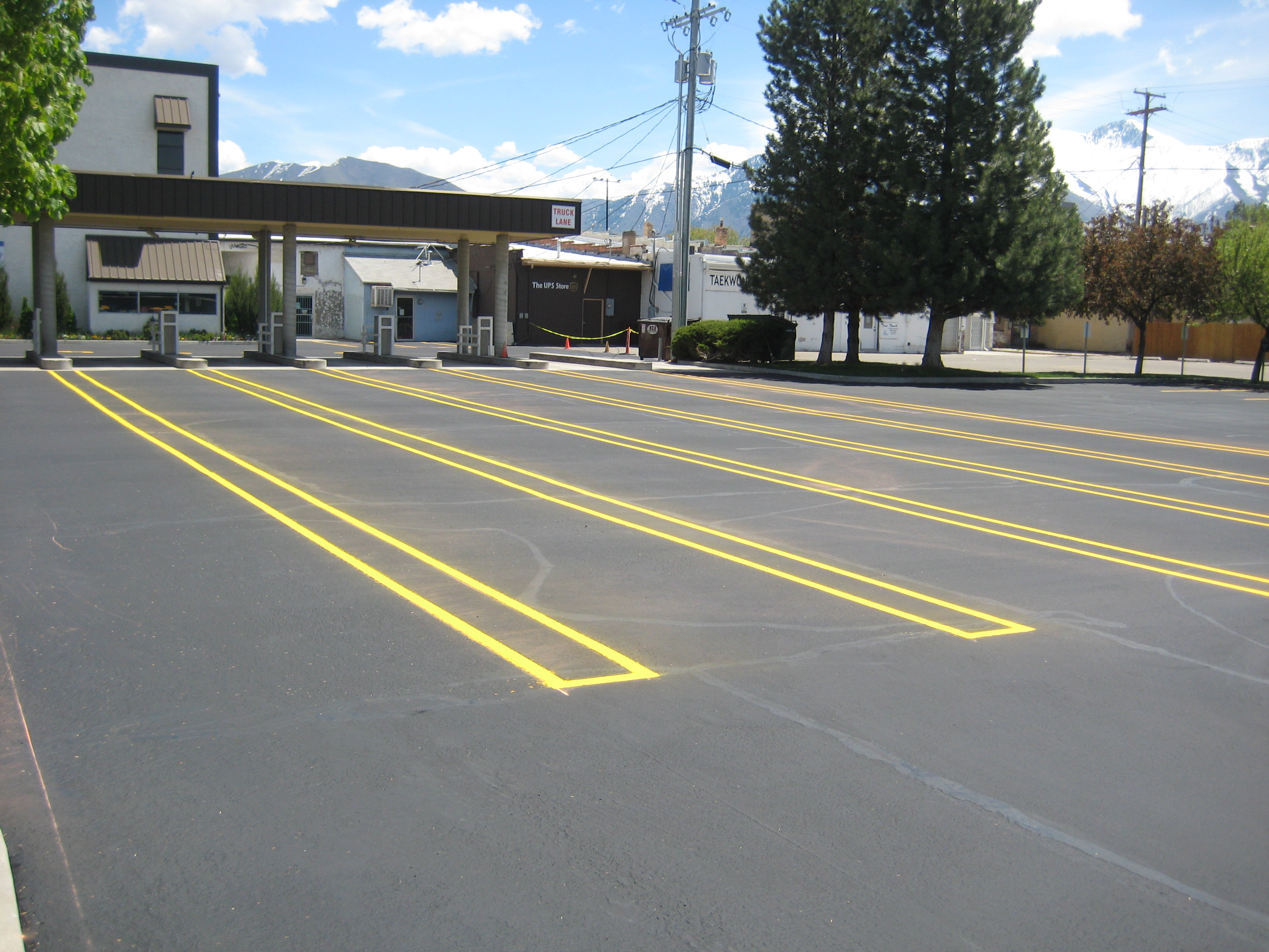 Commercial parking lot sealcoating and striping completed by Eckles Paving serving Cache Valley Utah