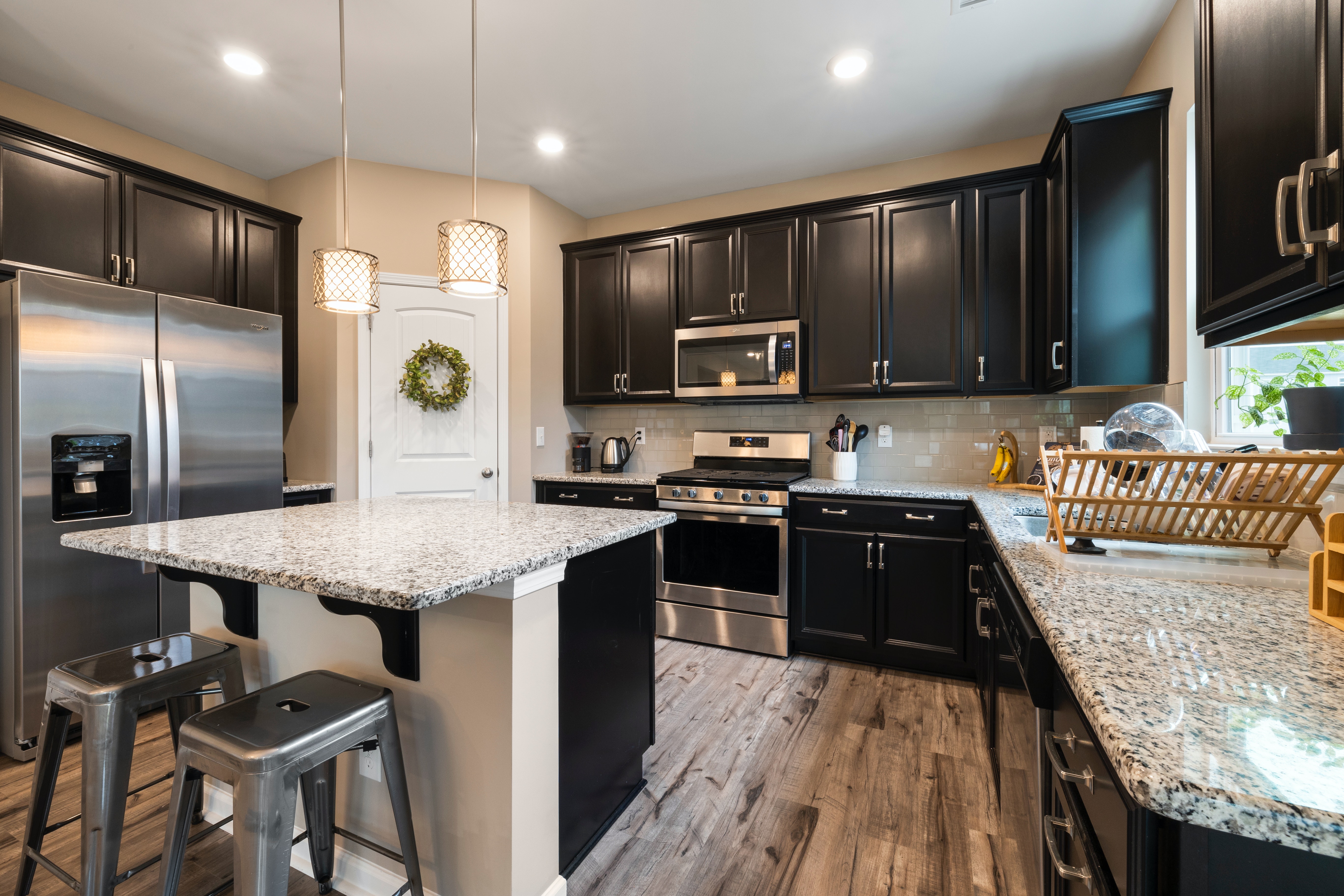 Kitchen after kitchen cabinet painting in Murray, UT.