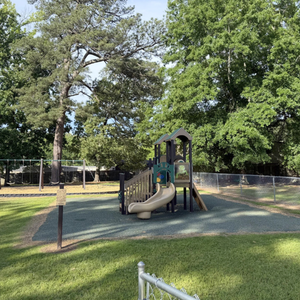 Safe, fenced playground area at Childcare Network where children enjoy active outdoor play