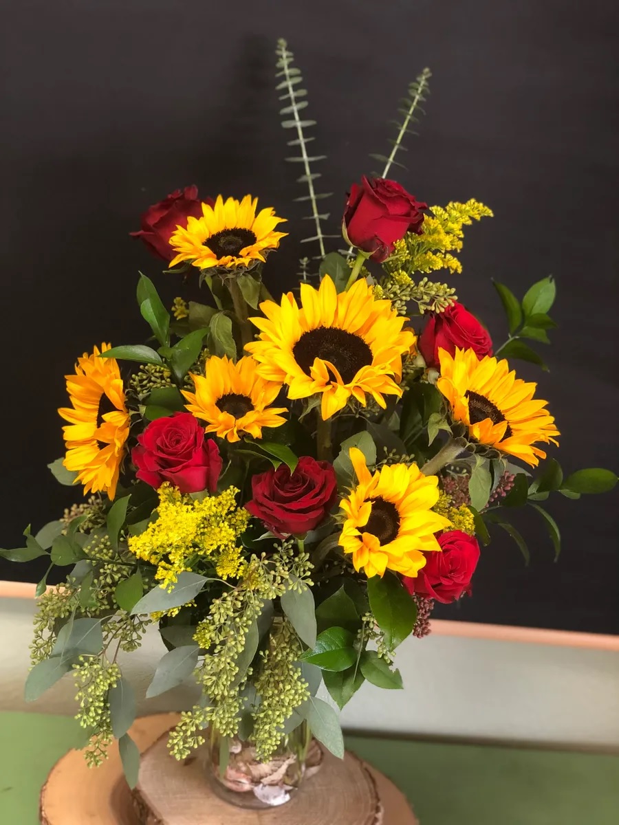 Sunflowers and Roses and Romance.  For the Sunflower lover.