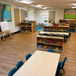 Bright and colorful preschool classroom at Childcare Network with age-appropriate learning materials