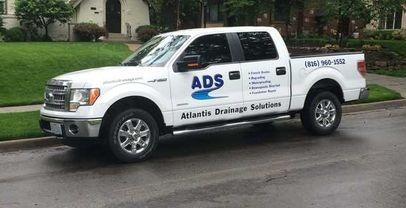 Atlantis Drainage Solutions ADS Truck - (816) 960-1552- https://www.atlantisdrainage.com- Drainage Solutions Kansas City, MO