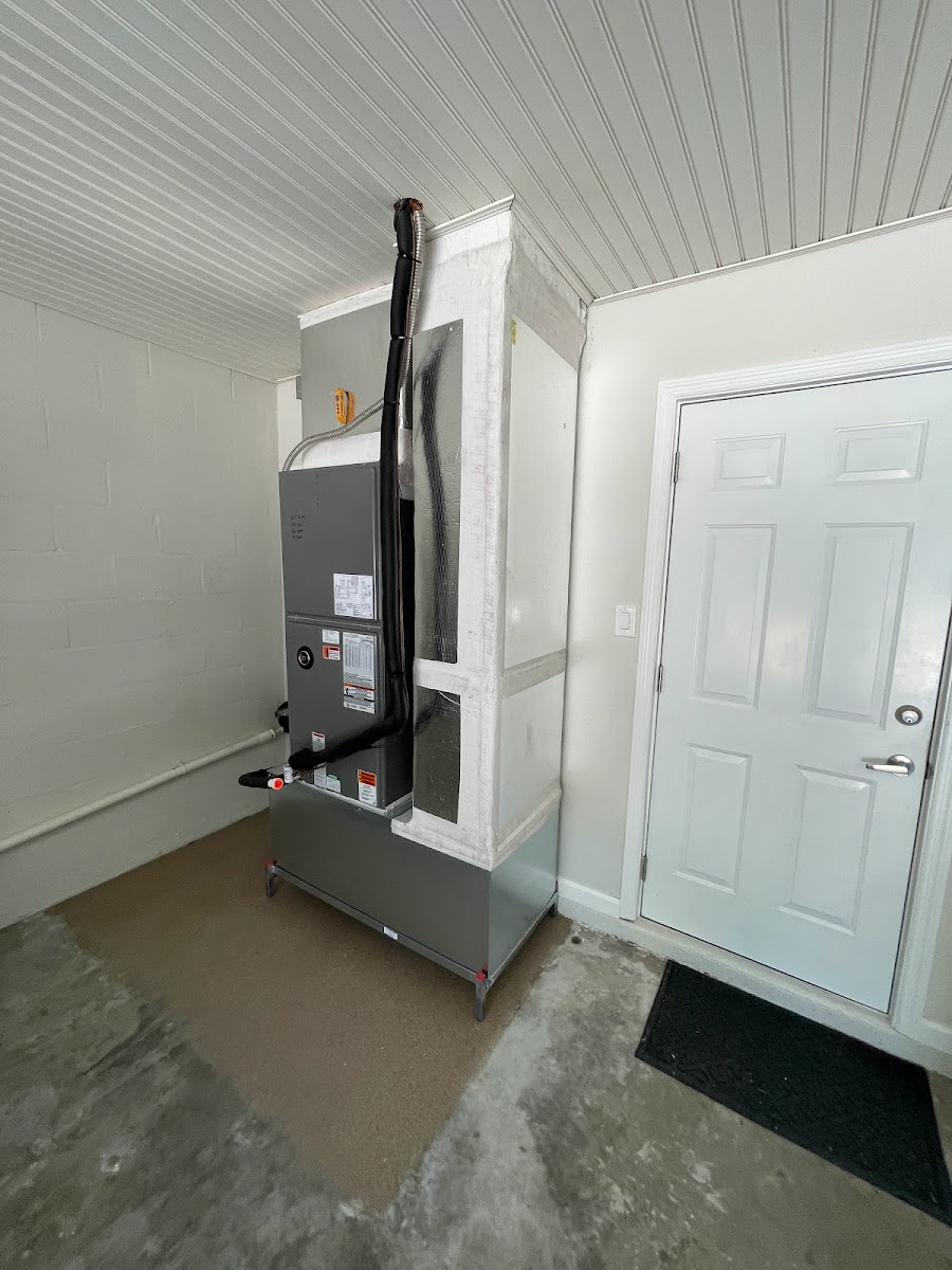 Indoor HVAC system installation with clean duct connections and professional setup for dependable home cooling.