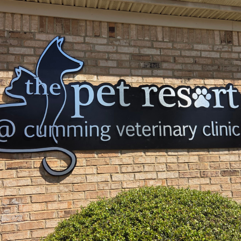 Exterior post and panel sign for The Pet Resort and Cumming Veterinary Clinic. This durable, double-sided outdoor sign features clean branding and contact information, perfect for roadside visibility and wayfinding.