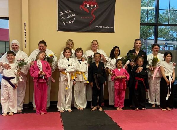 Congrats to all the moms who got their pink belts at Dojo Karate!