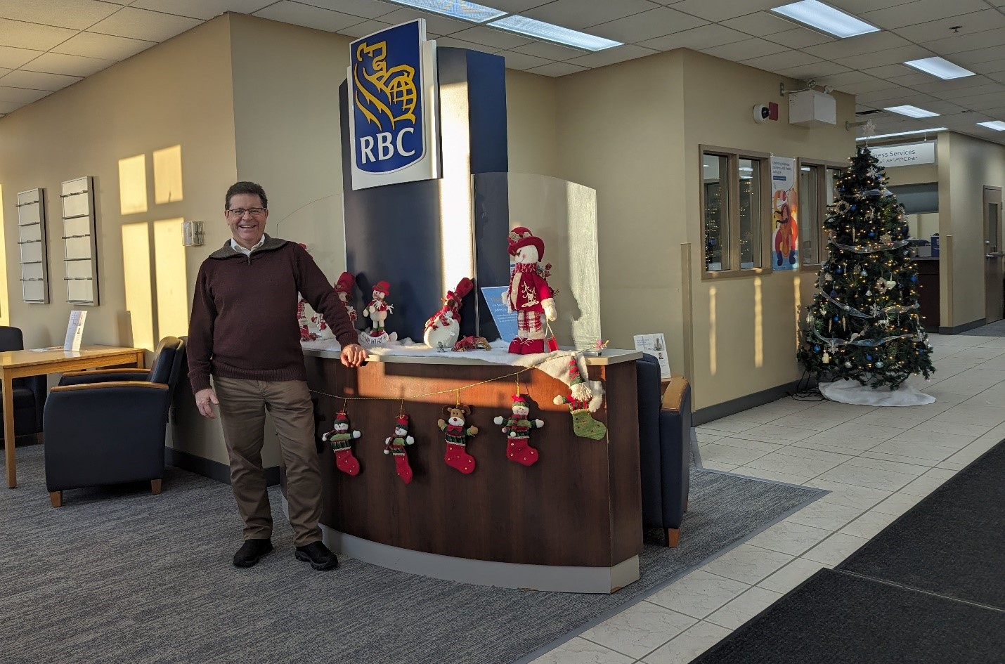 Wade inside the festive RBC Iqaluit Branch, December 8.jpg