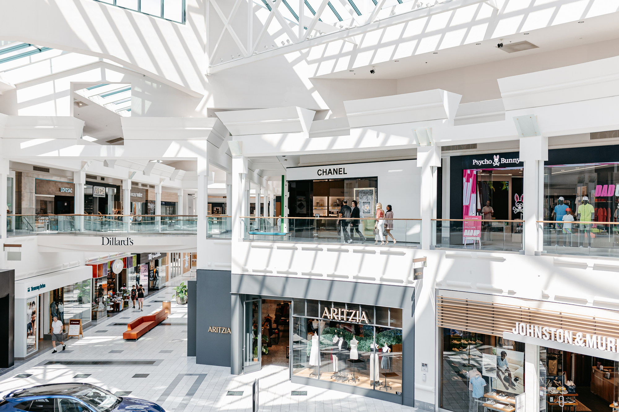 Indoor, main atrium looking out from Apple and Lululemon to Chanel Beauty and Fragrance. Also looking down the wing from Nordstrom to Dillards