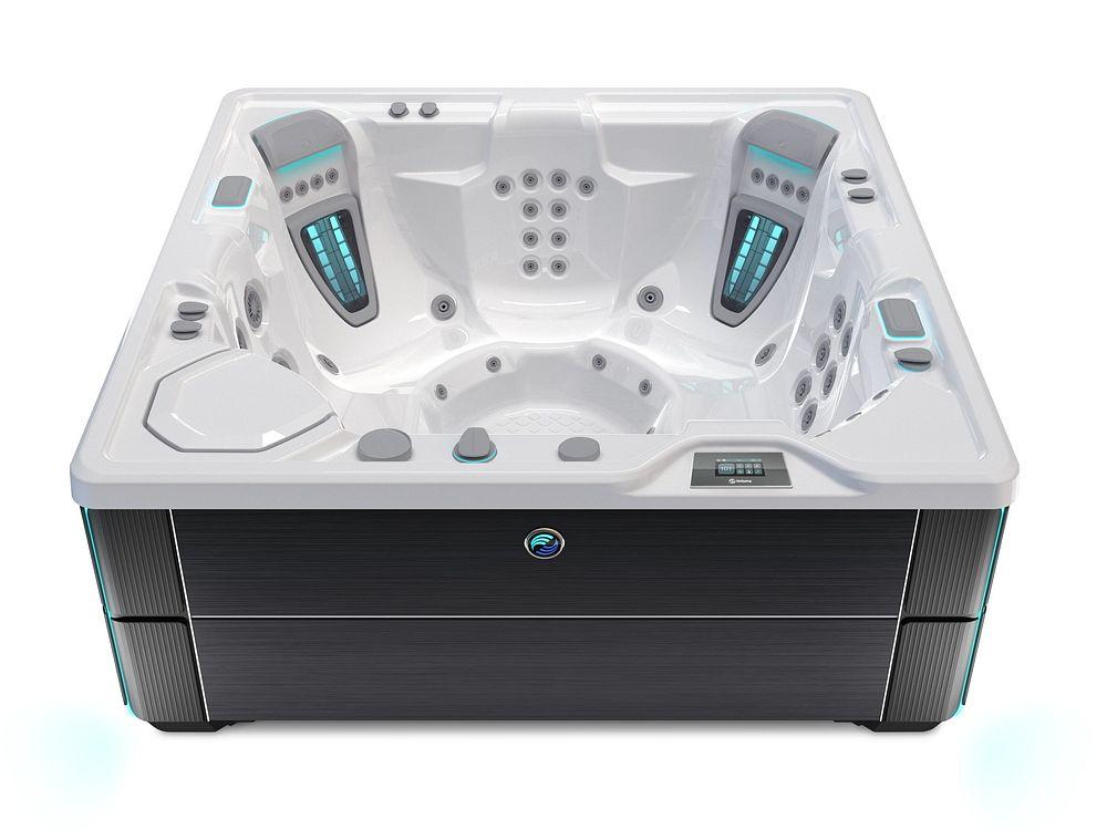 Empty Hot Spring hot tub. White shell, dark brown cabinet. Top-down angle from the front.